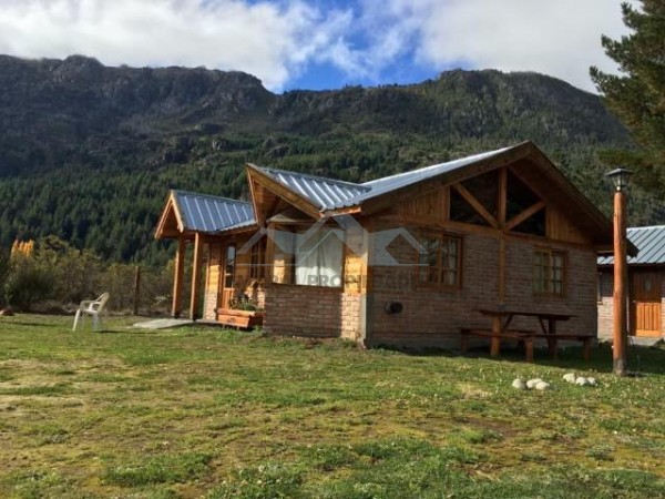  Complejo de 3 cabañas más monoambiente en LAGO PUELO a metros de ruta 16        16. USD 190000